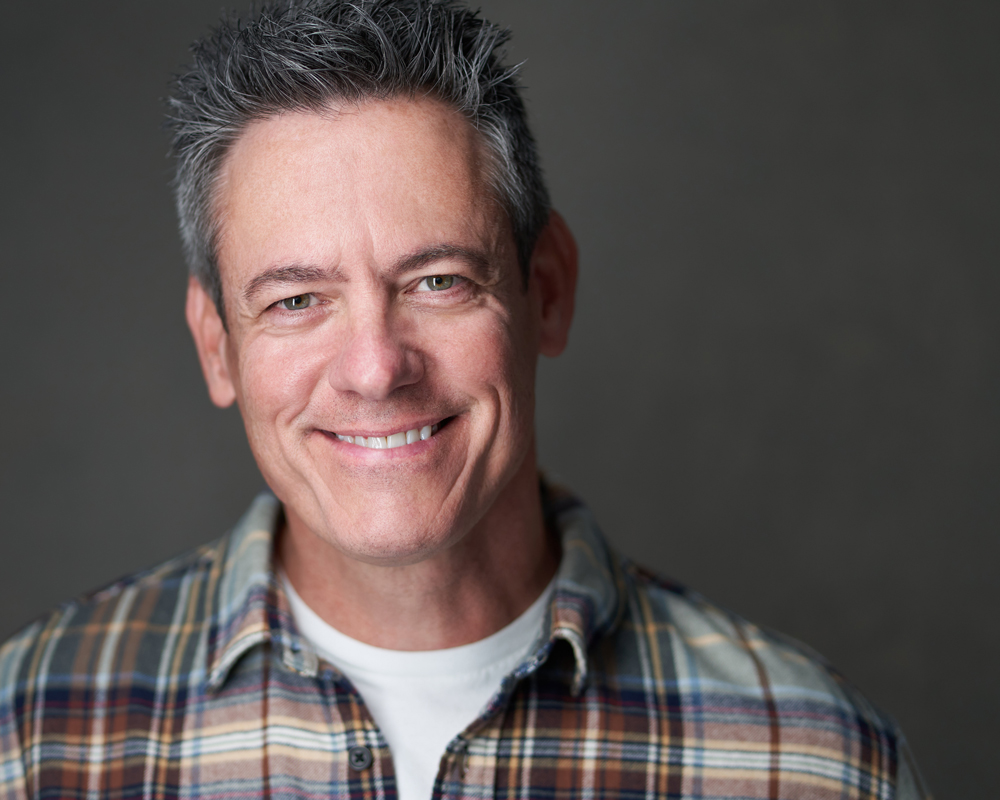 Actor-Headshot-Studio Professional Actor Headshot Button Down Shirt Smiling