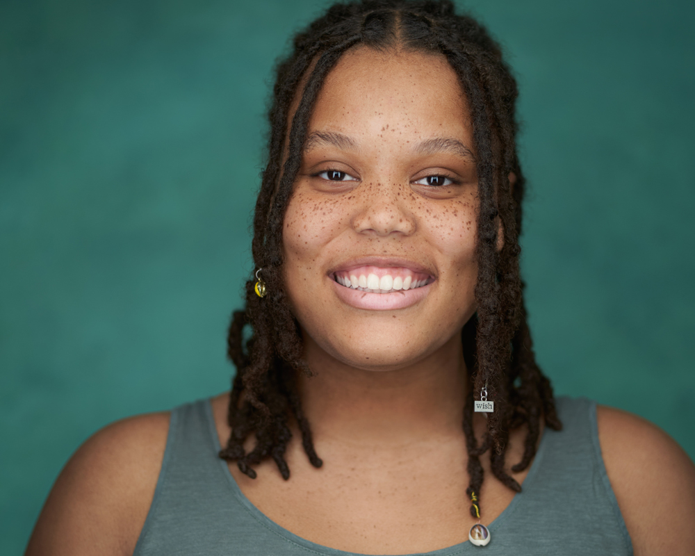 Actress-Headshot Teenage Actress Headshot on Green Background